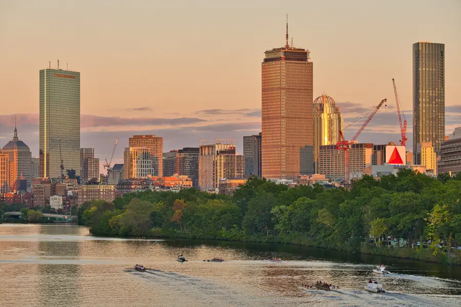 The Back Bay skyline in Boston, seen across the Charles River at sunset
